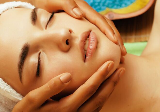 Hands on a girl's face
